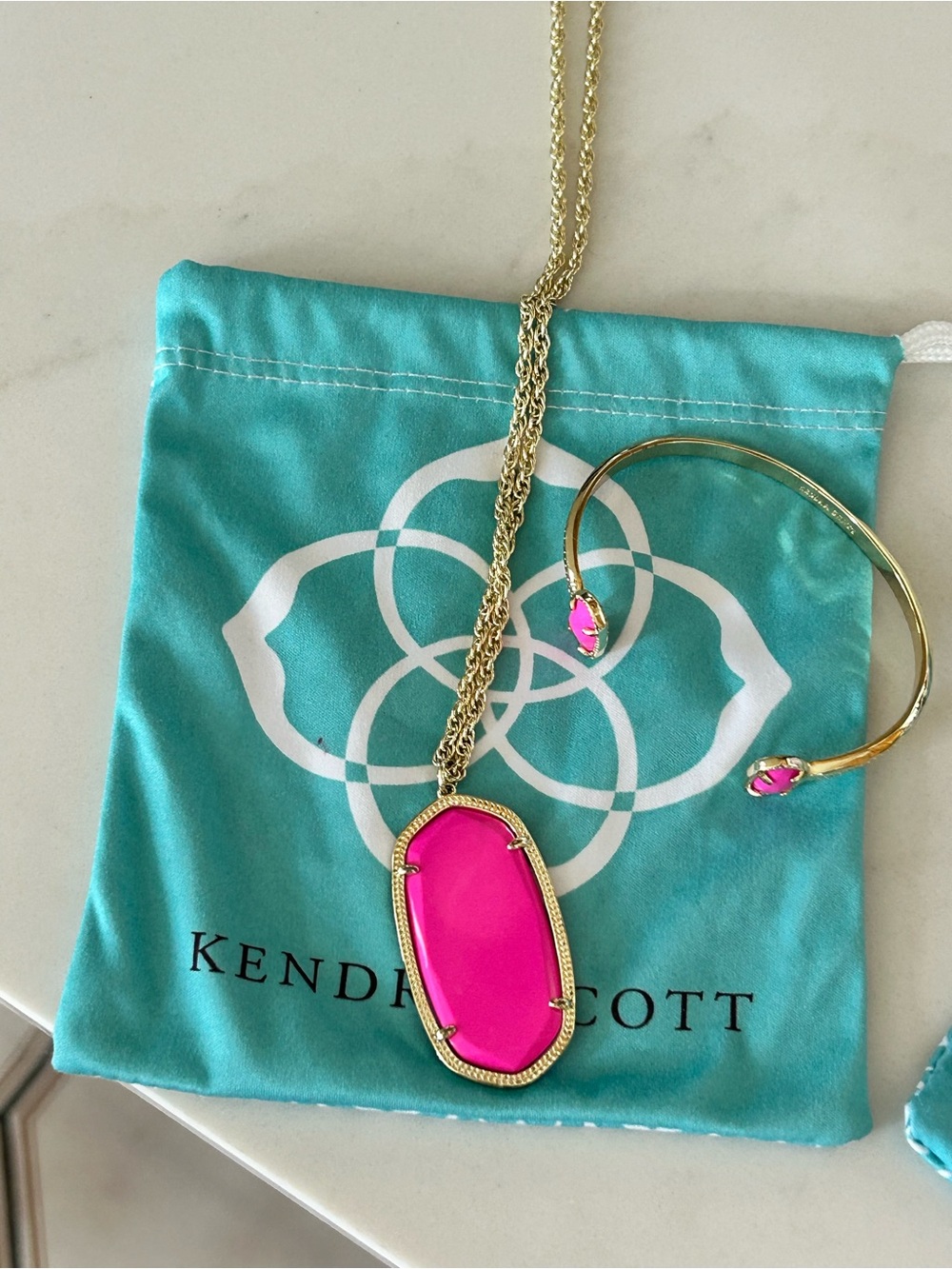 Kendra Scott necklace and cuff